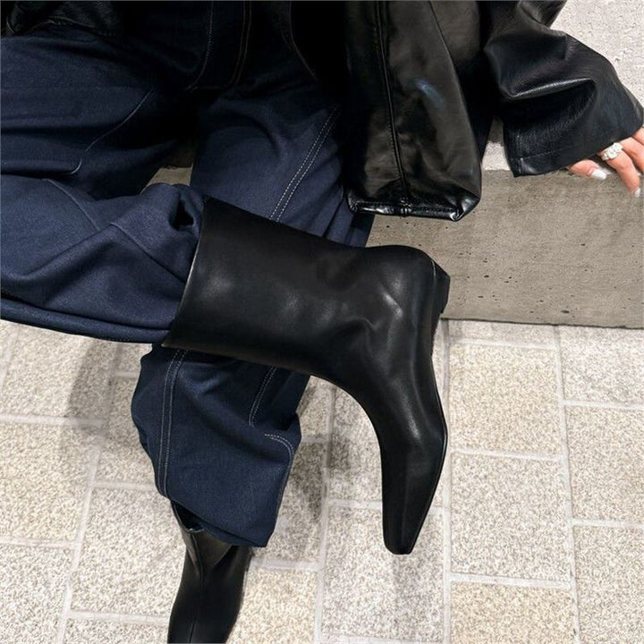 Women's midi ankle boots with pointed toe shape, suede look and sleek wedge heel Mune Fashion