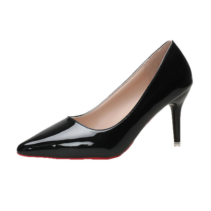 Ladies patent pumps with pointed toe, narrow stiletto and gold heel application Mune Fashion