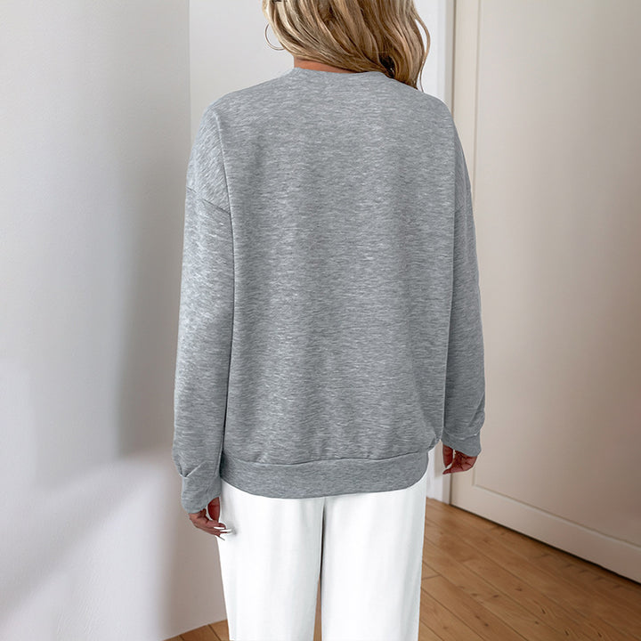 Women’s sweatshirt with sequined V-insert and oversized cut Mune Fashion