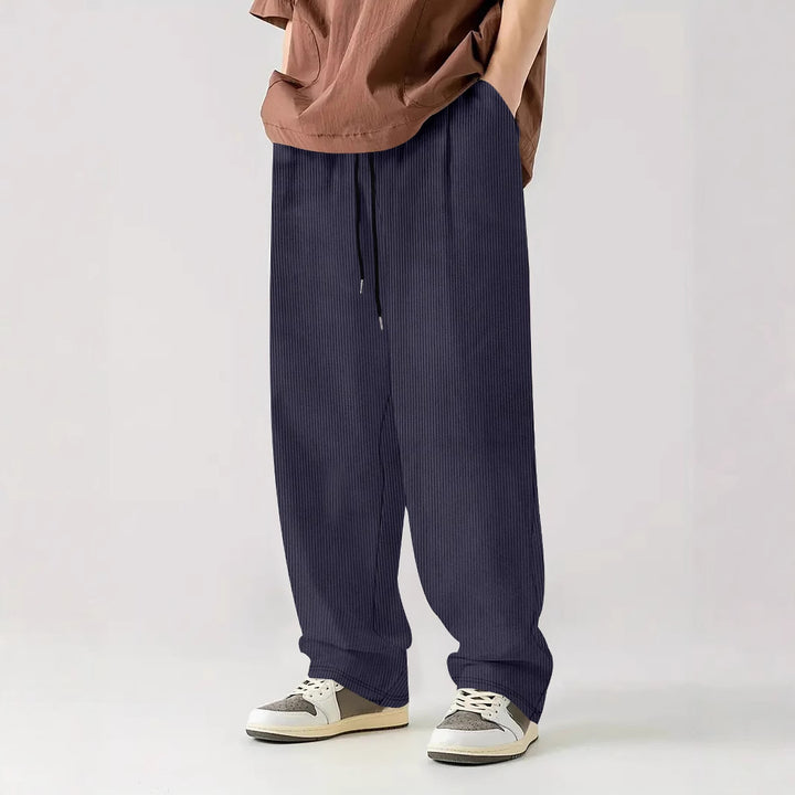 Men's loose Relax leisure pants made of ribbed jersey with drawstring, side pockets, and wide leg Mune Fashion