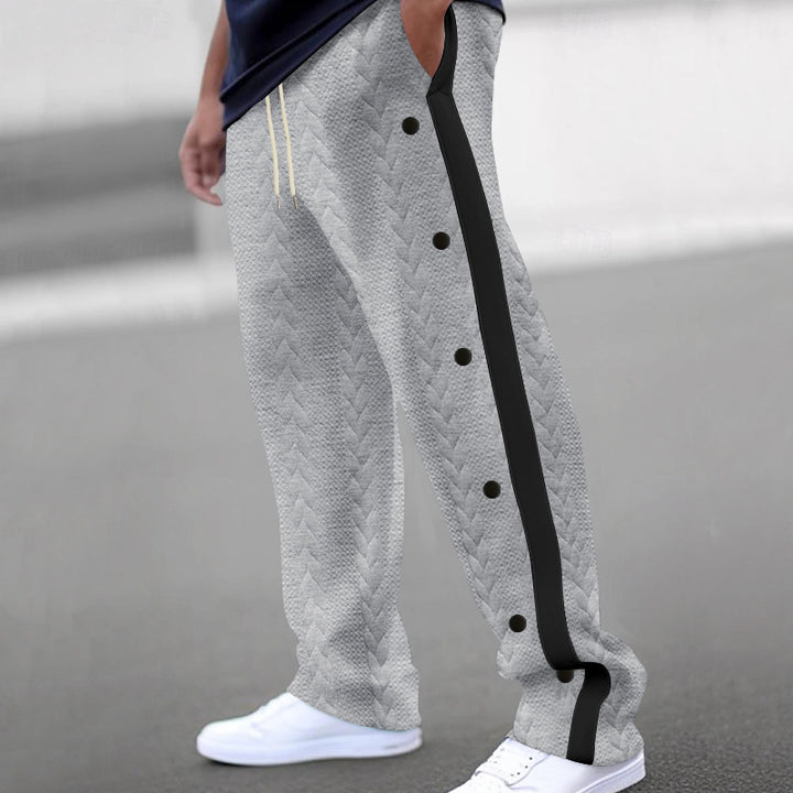 Men's quilted casual pants with continuous snap button placket and contrast stripes Mune Fashion