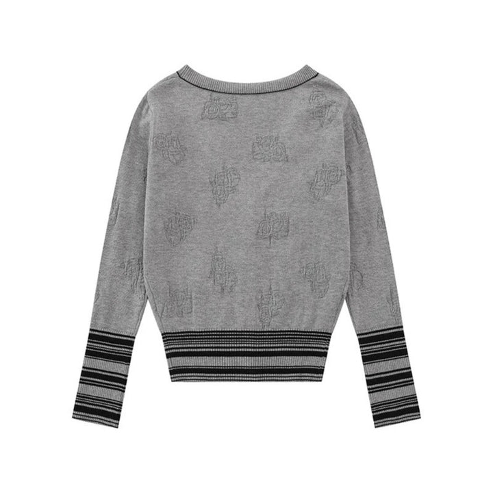 Ladies cardigan with V-neck, fine jacquard pattern and contrasting cuffs Mune Fashion
