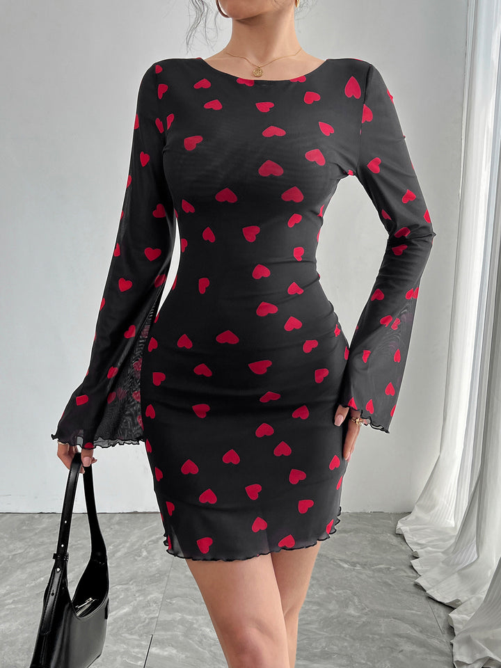 Women's figure-hugging mini dress made of fine mesh fabric with heart pattern and trumpet sleeves Mune Fashion