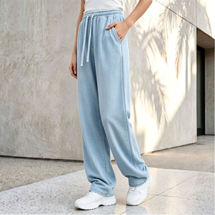 Women's wide lounge palazzo pants with high comfort waistband, drawstring, side pockets, and decorative side seam Mune Fashion