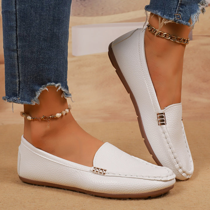 Women's slim moccasin slippers with hand-stitched front seam, padded comfort footbed, and flexible non-slip rubber sole Mune Fashion