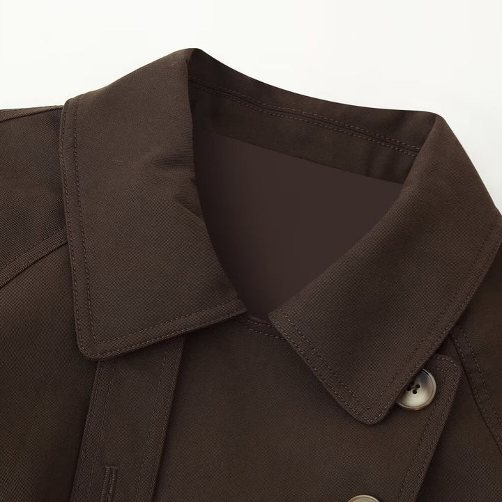Women's short trench-style jacket with tie belt, raglan sleeves, and tailored fit Mune Fashion