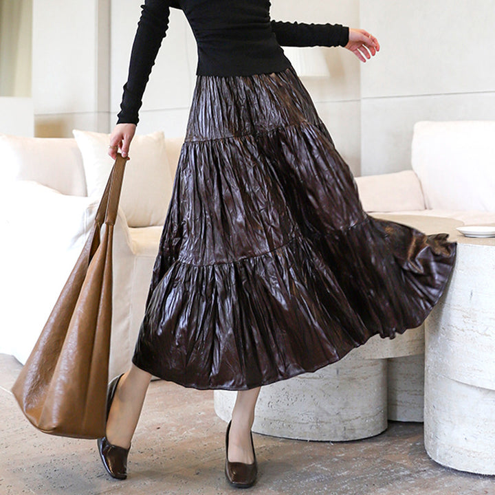 Women's tiered maxi skirt in coated crinkle material with elastic comfort waistband Mune Fashion
