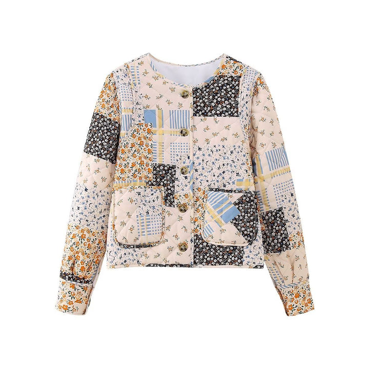 Women's padded short jacket in patchwork quilt style with round neckline and patch pockets Mune Fashion