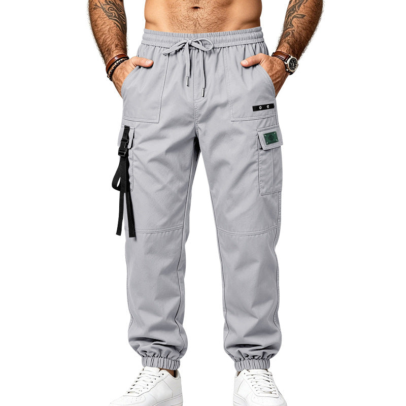 Men's utility cargo pants in jogger style with elastic waistband, multiple pockets and leg straps Mune Fashion