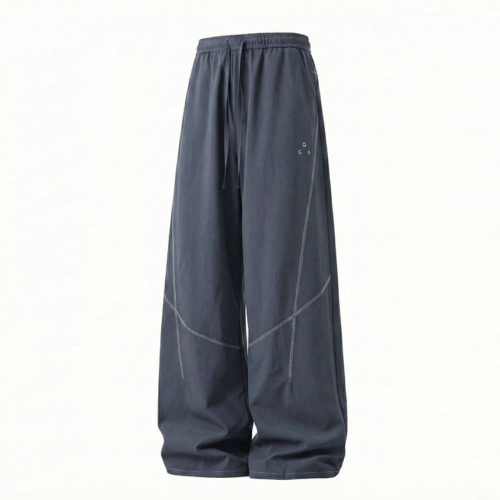 Unisex Wide technical balloon pants with elastic waistband and drawstring Mune Fashion