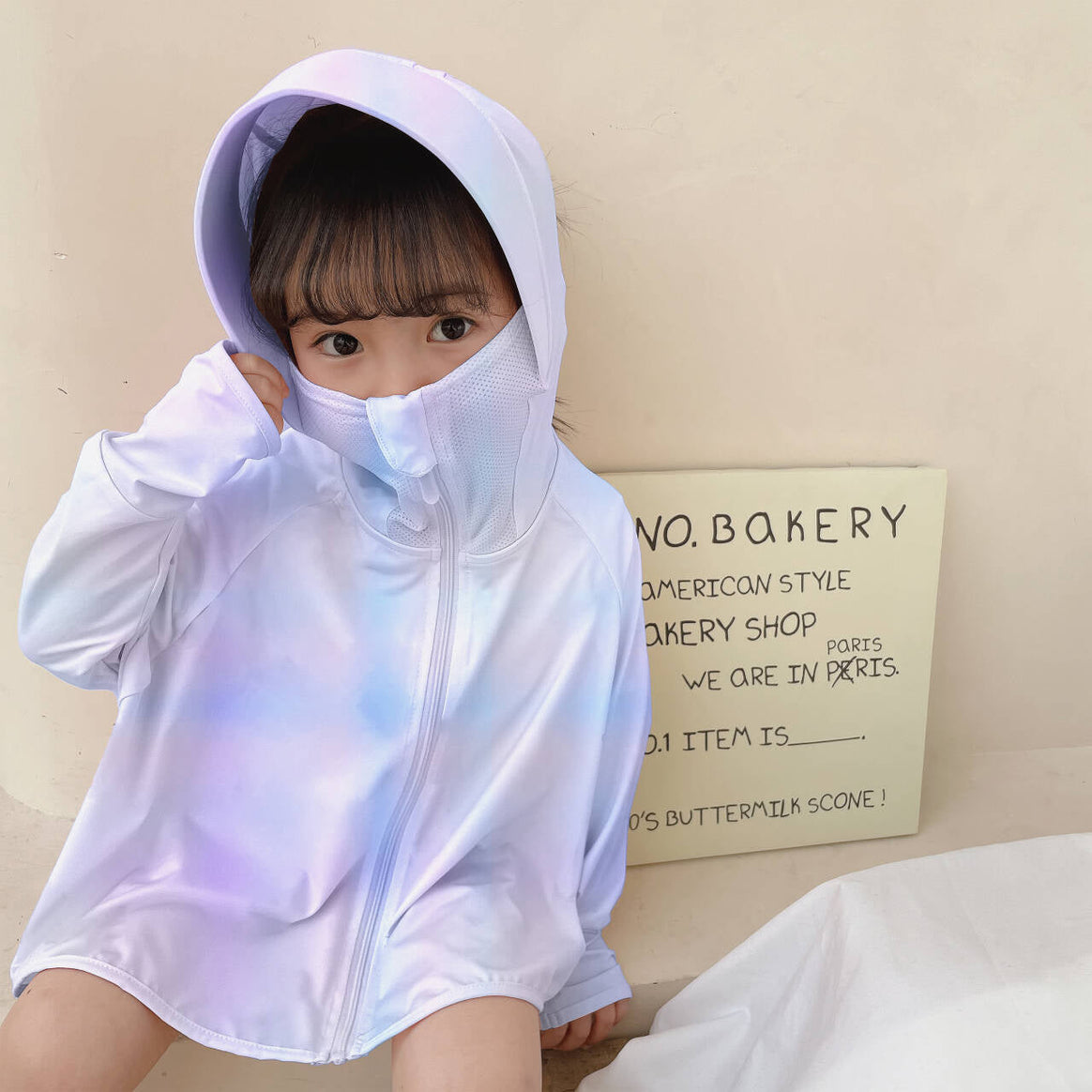 Women's Lightweight and Breathable Hooded Jacket with Playful Design Mune Fashion