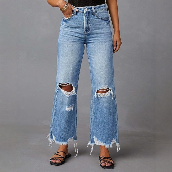 Women's high-waisted flared Destroyed Jeans with knee fraying and raw hem Mune Fashion