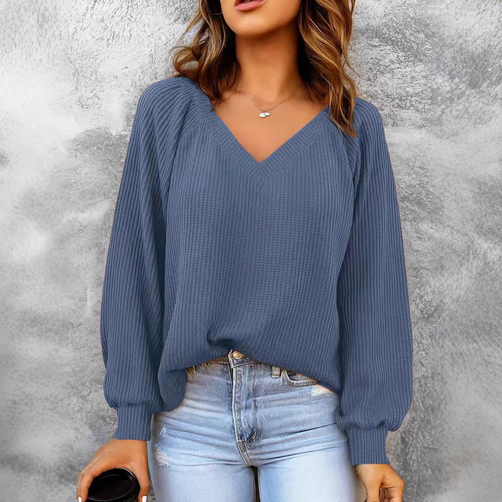 Women's fine structure knit sweater with V-neck, balloon sleeves, and ribbed cuffs Mune Fashion