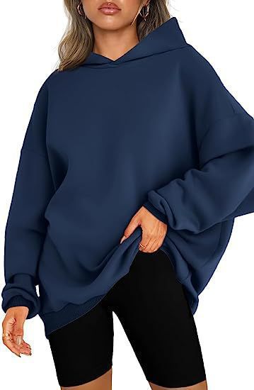 Women's oversized hoodie in longline cut with raglan sleeves and soft inner lining Mune Fashion
