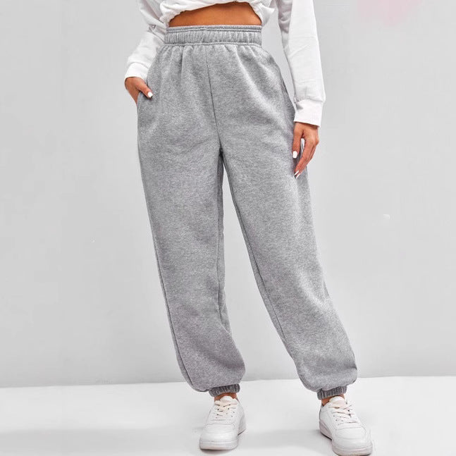 Women's high-cut Relax-Fit jogging pants with elastic waistband, side pockets, and gathered leg cuffs Mune Fashion