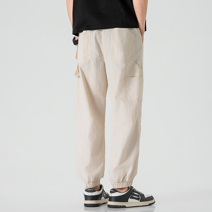 Men's Nylon-Mix Relaxed Jogger with elastic comfort waistband, concealed zipper pockets, and ribbed ankle cuffs Mune Fashion