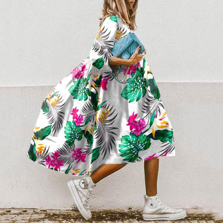Ladies nan lightweight cotton swing dress with large floral print, 3/4 balloon sleeves and gathered waist Mune Fashion