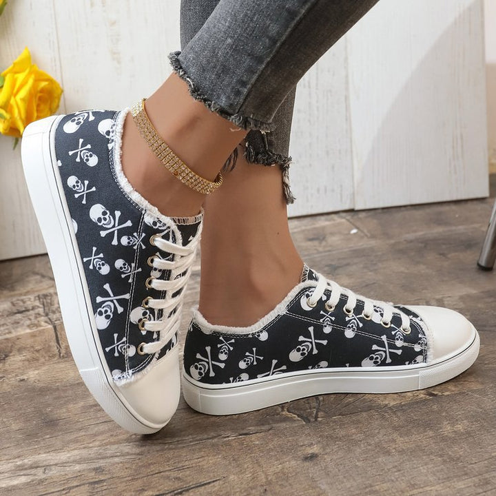 Women’s casual platform sneaker with skull print, frayed canvas trim and reinforced toe cap Mune Fashion