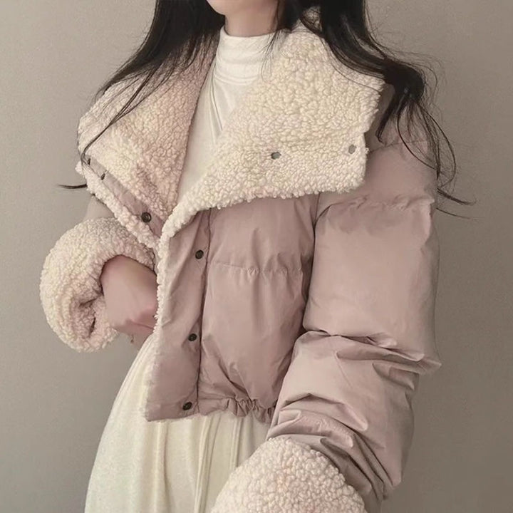 Women's short quilted puffer jacket with teddy collar, roll-up sleeves, and drawstring hem Mune Fashion
