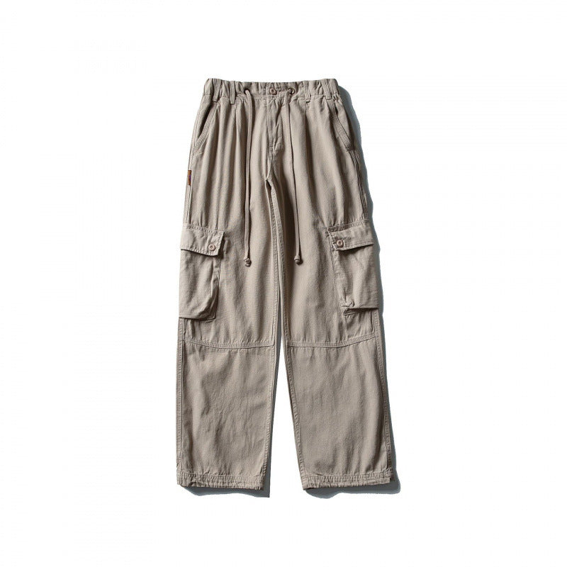 Men's cargo pants with wide leg, elastic drawstring waistband, and patch flap pockets Mune Fashion
