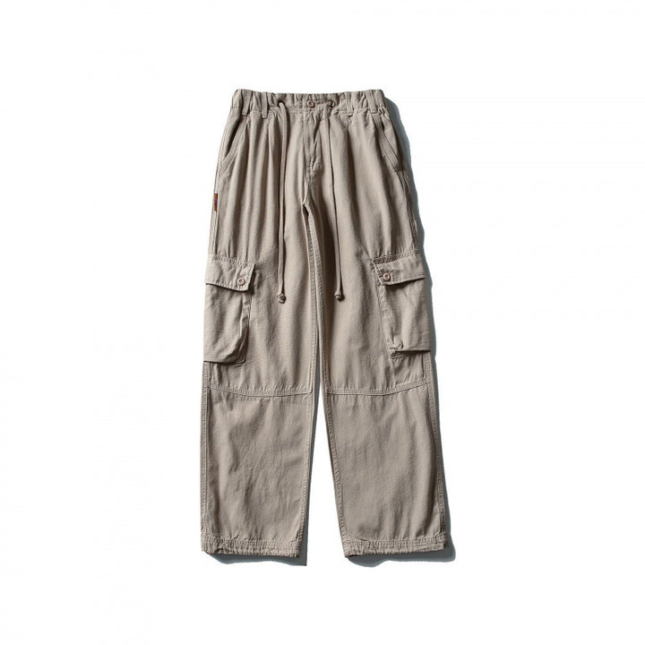 Men's cargo pants with wide leg, elastic drawstring waistband, and patch flap pockets Mune Fashion