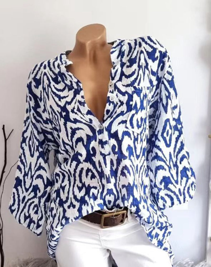 Women nan locker cut tunic blouse with Ikat pattern, V-neck and three-quarter sleeves Mune Fashion