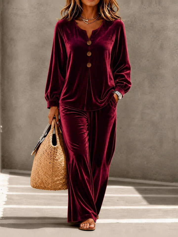 Women in soft velvet lounge set with V-neck, button placket, and wide leg Mune Fashion
