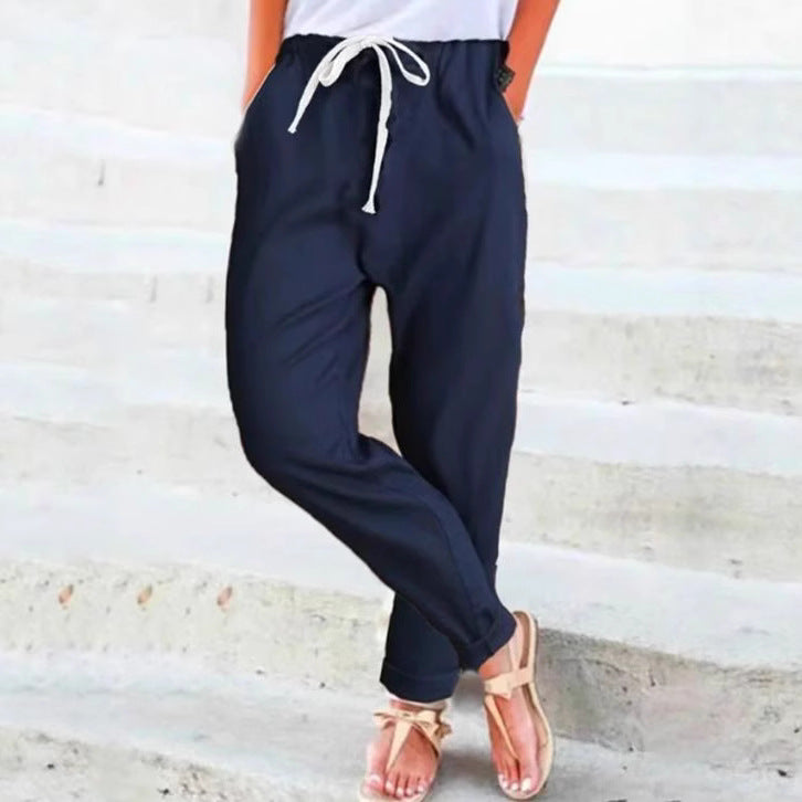 Women's casual relaxed pants with elastic waistband, drawstring, side pockets, and rolled hem Mune Fashion