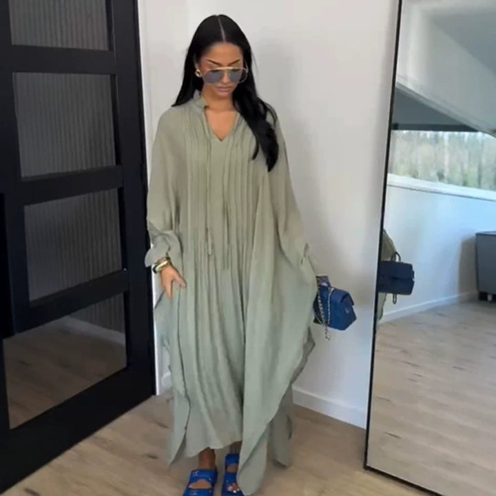 Women's maxi dress in kaftan style with ruffled collar, tie straps, and voluminous sleeves Mune Fashion