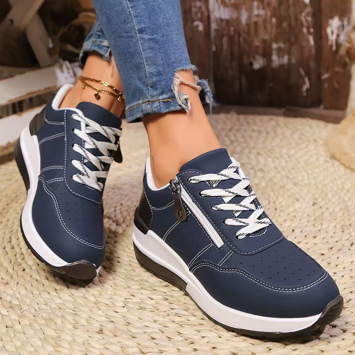 Women's wedge sneakers with side zipper and perforated upper material Mune Fashion