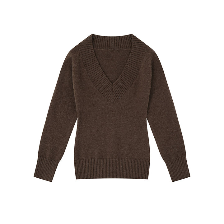 Women's fine knit pullover with deep V-neck, wide ribbed hem, and relaxed fit Mune Fashion