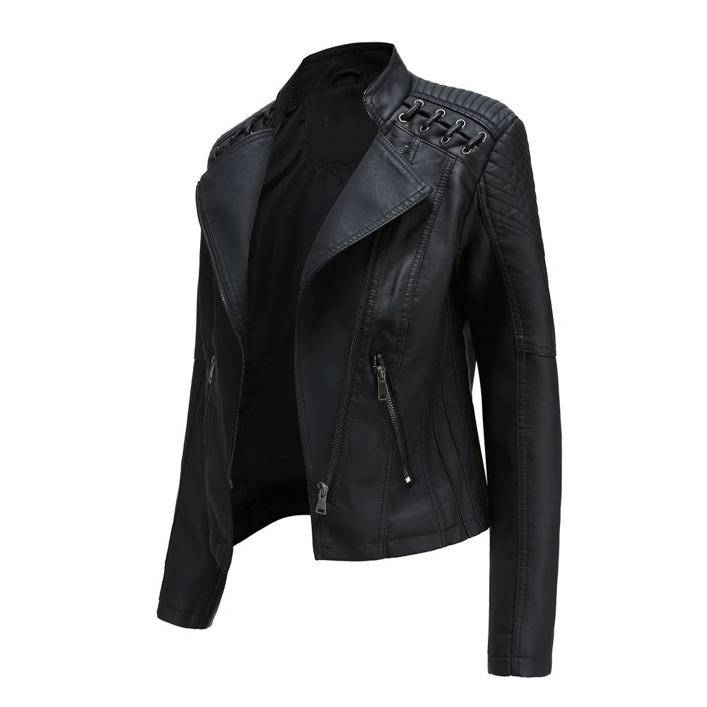 Ladies tailored faux leather biker jacket with quilted shoulder section, asymmetrical zipper and decorative eyelets Mune Fashion