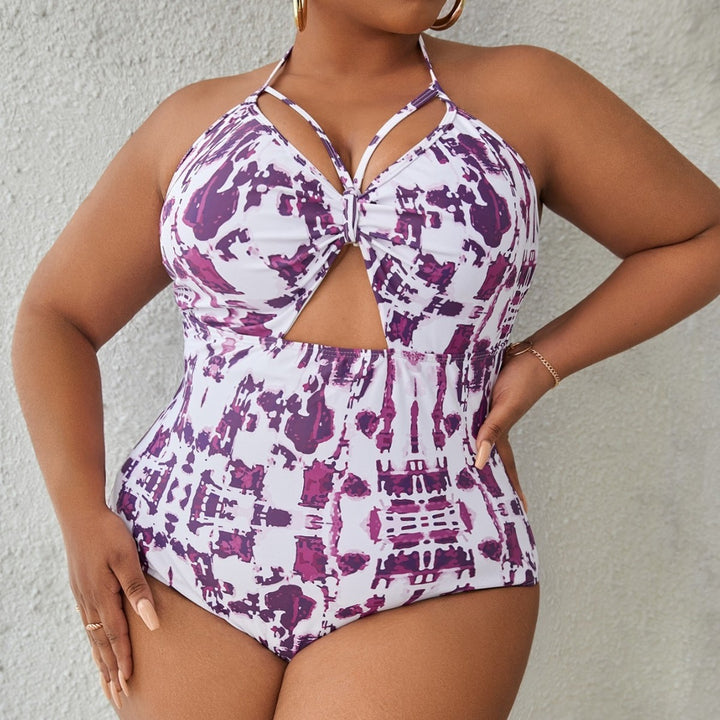 Women's one-piece swimsuit with creative cut-out design and refined strap details Mune Fashion