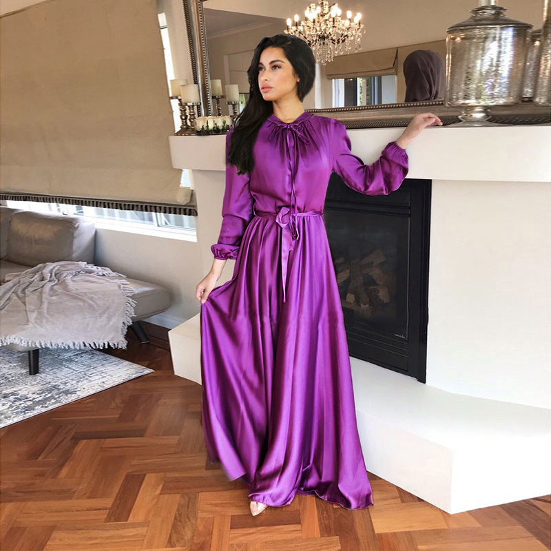 Women's maxi dress made of flowing satin with stand-up collar and tie belt Mune Fashion
