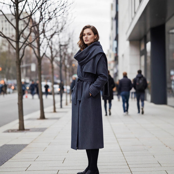 Women’s long coat with oversized shawl collar, belt at the waist and pinstripes Mune Fashion