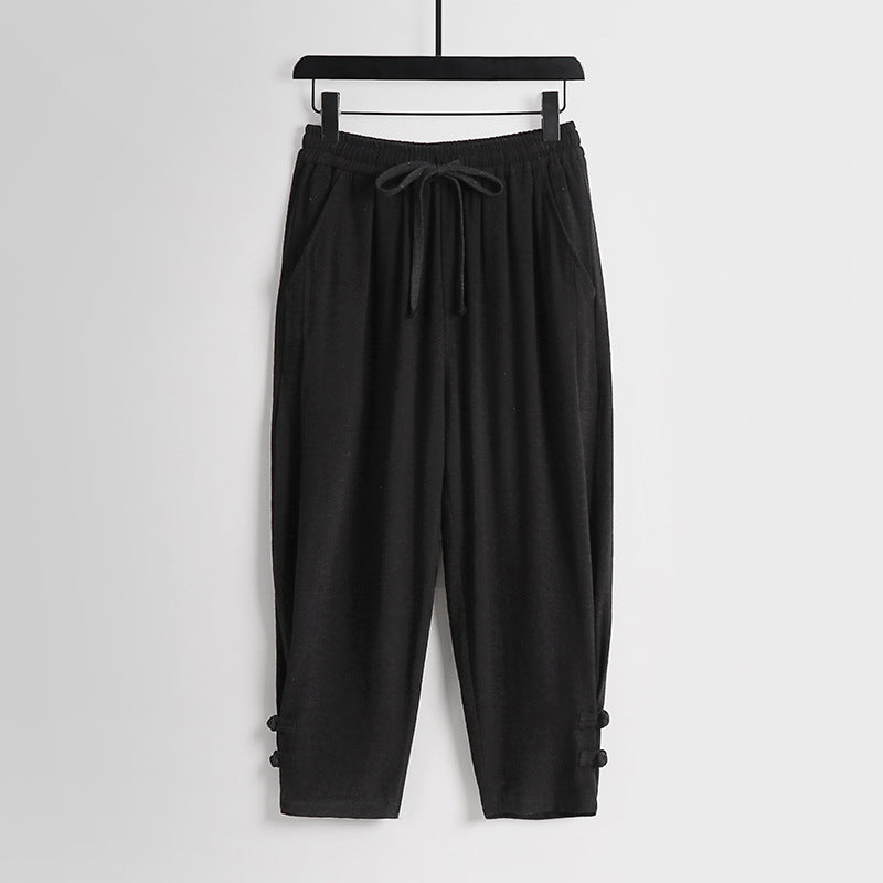 Women's casual jogging pants with drawstring and decorative buttons at the ankle Mune Fashion