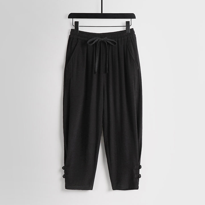 Women's casual jogging pants with drawstring and decorative buttons at the ankle Mune Fashion