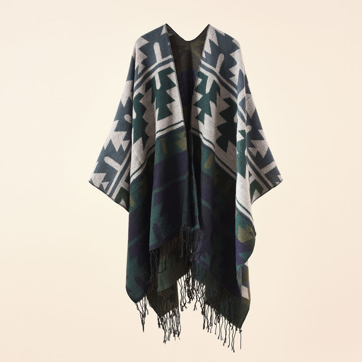 Women Oversize Ruana with V-neck, coarse jacquard pattern and long fringes Mune Fashion