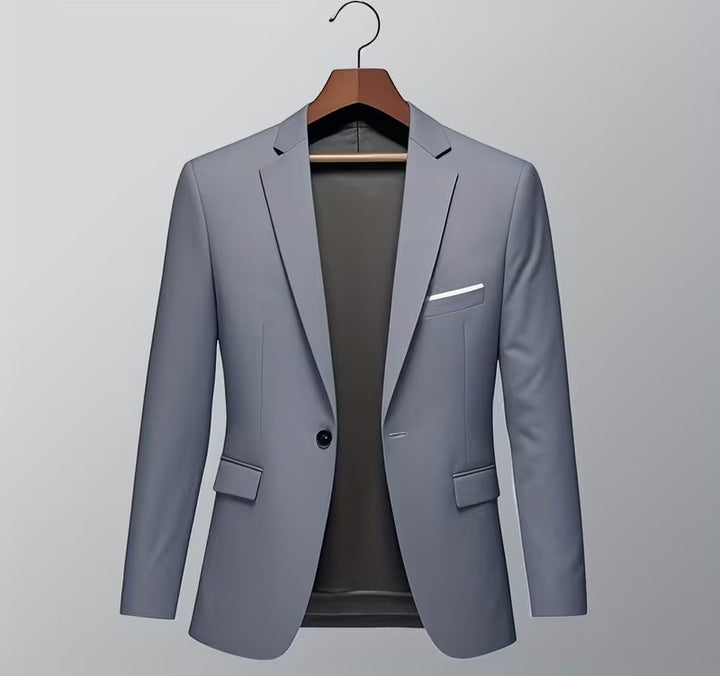 Men's slim-fit tuxedo jacket with prominent lapels, concealed breast piping, and light shoulder padding Mune Fashion