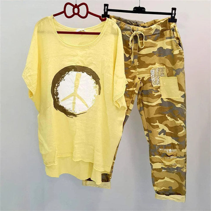 Women’s casual leisure two-piece with wide-cut linen look shirt, peace symbol and camouflage jog pants with patch details Mune Fashion