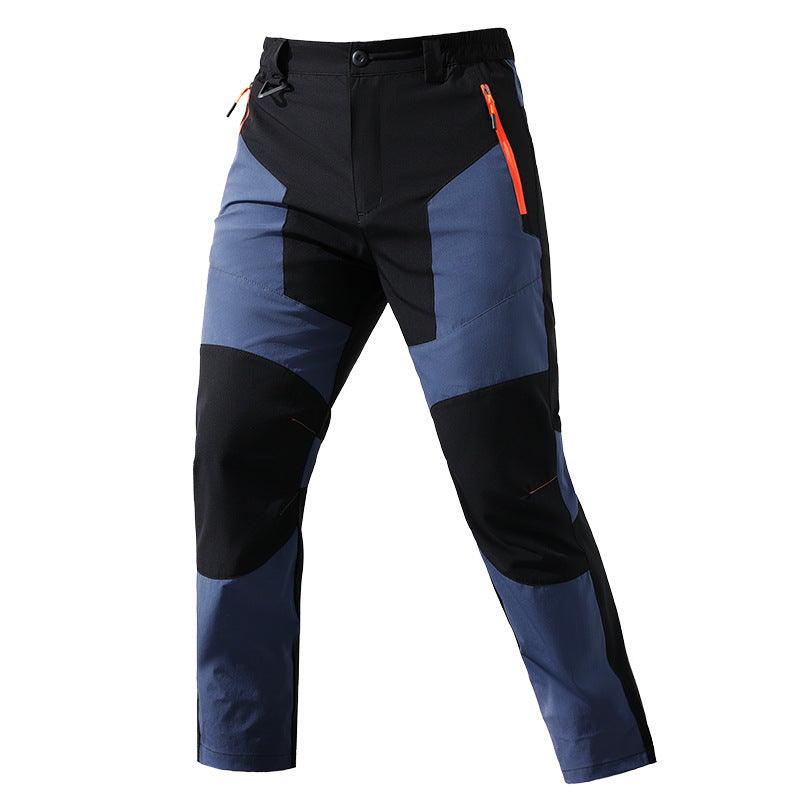 Men's multifunctional trekking pants with multi-way stretch knee reinforcement and elastic waistband.