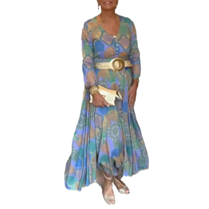 Women’s patterned maxi dress with full button placket, V-neck, long sleeves, and pleated skirt Mune Fashion