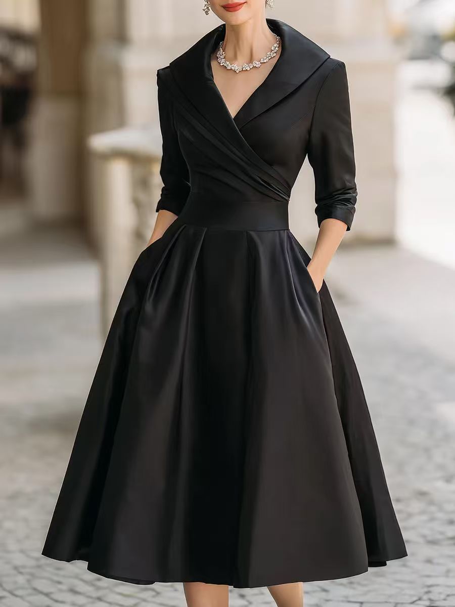Women's elegant midi dress with wrap top, three-quarter sleeves, and side pockets Mune Fashion