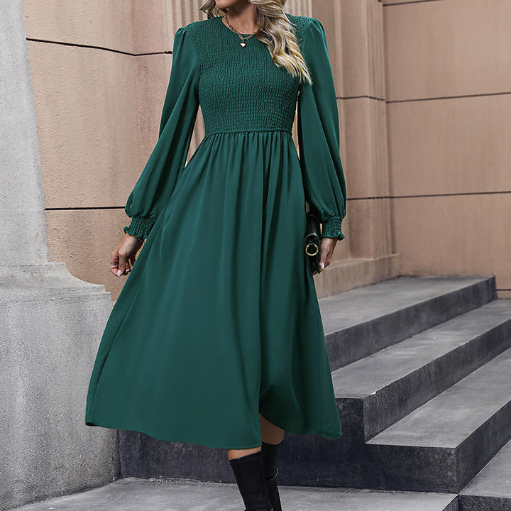 Women's midi dress with smocked bodice, long balloon sleeves, and flared skirt Mune Fashion