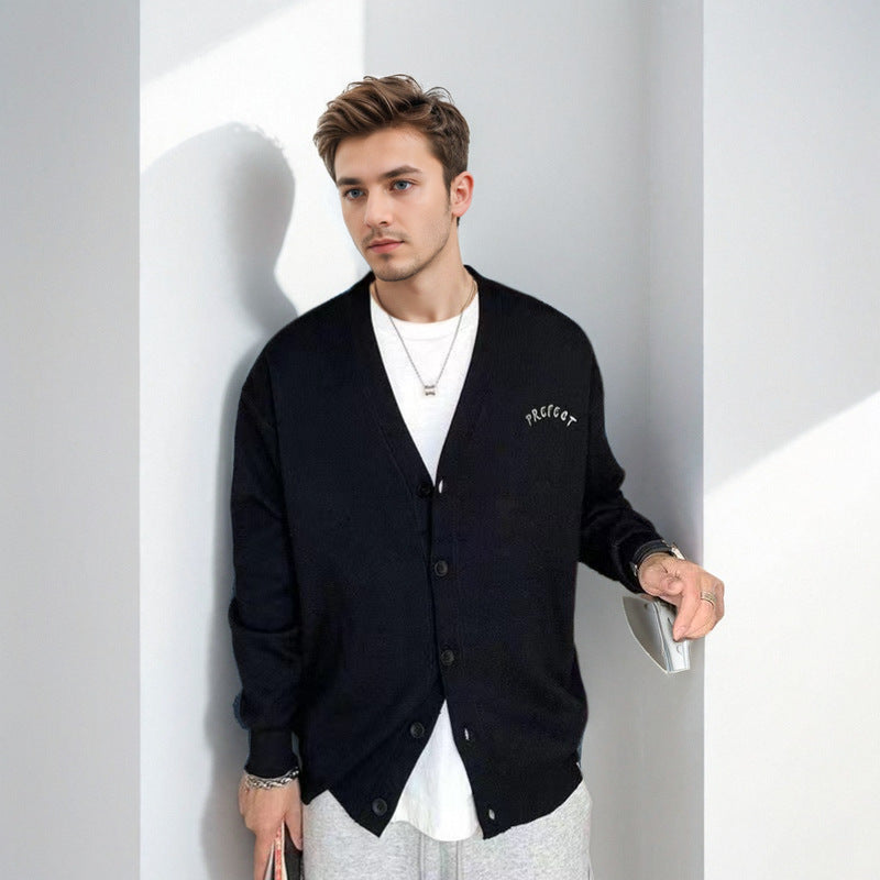 Men's oversized knitted sweater with large jacquard face design and ribbed hem Mune Fashion