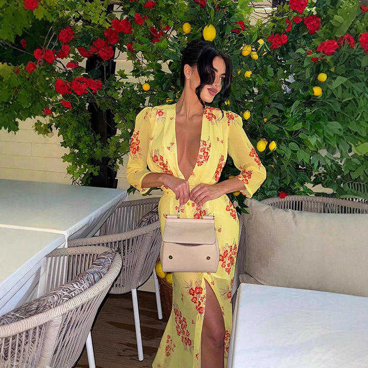 Women's maxi dress with deep V-neckline, tailored corset and high leg slit Mune Fashion