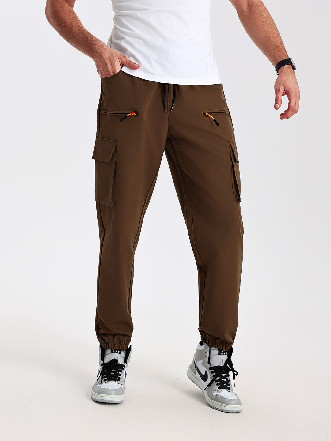 Men's tapered cut utility cargo pants in jogger style with drawstring waistband, zippered pockets & elastic leg cuffs Mune Fashion
