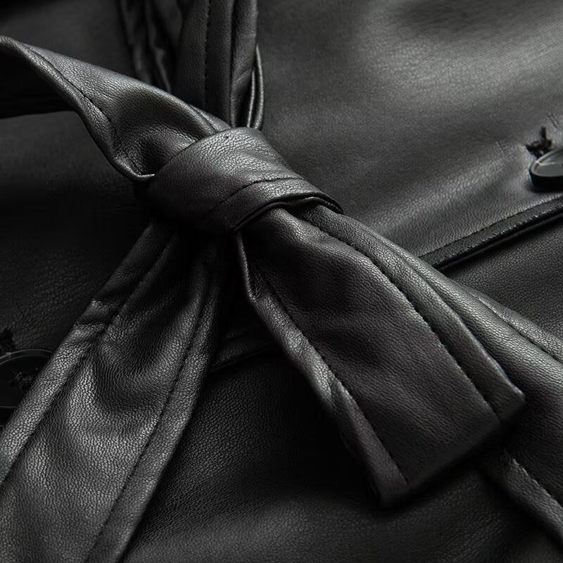 Women's short faux leather trench coat with waist belt and shoulder cape Mune Fashion