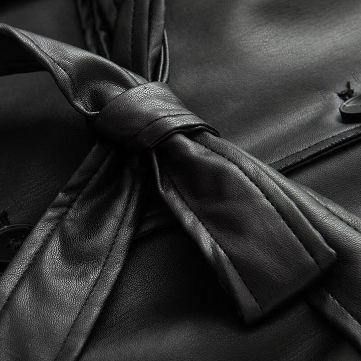 Women's short faux leather trench coat with waist belt and shoulder cape Mune Fashion
