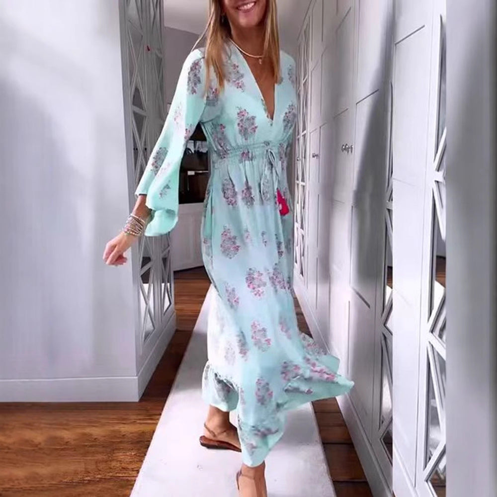 Women’s airy-flowing Boho midi dress with V-neck, gathered smock waist, drawstring with tassels, and asymmetrical ruffled hem Mune Fashion